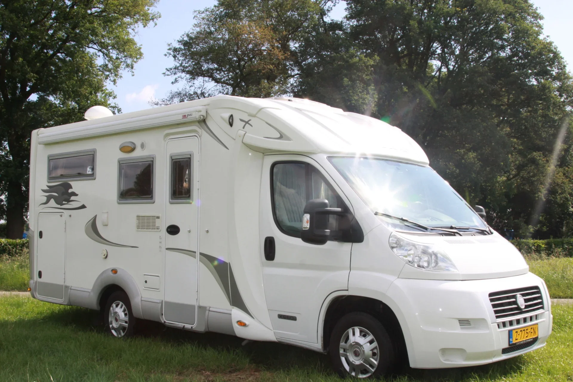 Fiat met lengtebedden